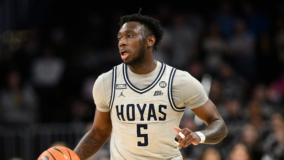 Georgetown guard Jay Heath (5) in action during the second half of an NCAA college basketball game against Providence, Sunday, Feb. 26, 2023, in Washington. Providence won 88-68. (AP Photo/Nick Wass)