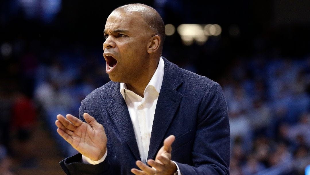 Harvard head coach Tommy Amaker reacts during an NCAA college basketball game against North Carolina in Chapel Hill, N.C.