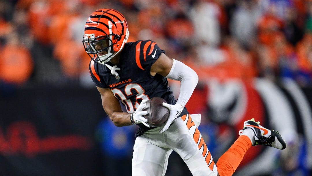 Cincinnati Bengals wide receiver Tyler Boyd (83) catches a pass by the sidelines during an NFL football game against the Buffalo Bills, Sunday, Nov. 5, 2023, in Cincinnati. (AP Photo/Zach Bolinger)