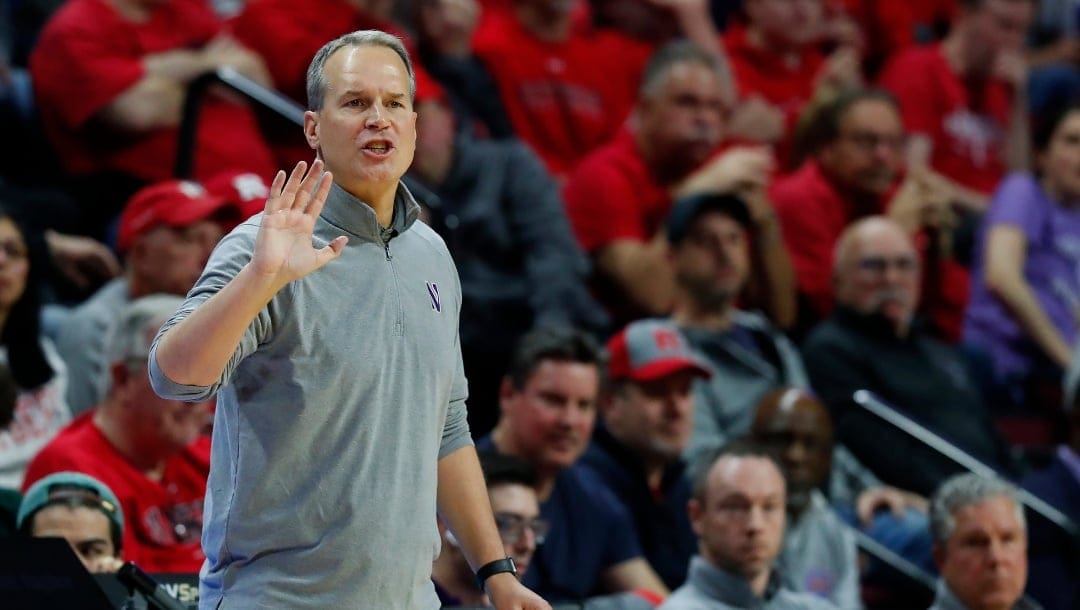 Northwestern head coach Chris Collins coaches against Rutgers during the second half of an NCAA college basketball game, Sunday, March 5, 2023 in Piscataway, N.J. Northwestern won 65-53. (AP Photo/Noah K. Murray)