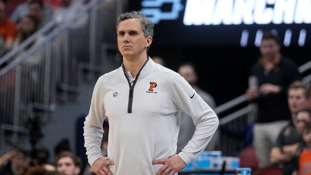 Princeton head coach Mitch Henderson watches play against Creighton in the first half of a Sweet 16 round college basketball game in the South Regional of the NCAA Tournament, Friday, March 24, 2023, in Louisville, Ky.