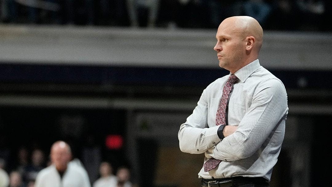 Saint Francis head coach Rob Krimmel watches during the first half of an NCAA college basketball game against Butler, Thursday, Nov. 17, 2022, in Indianapolis.