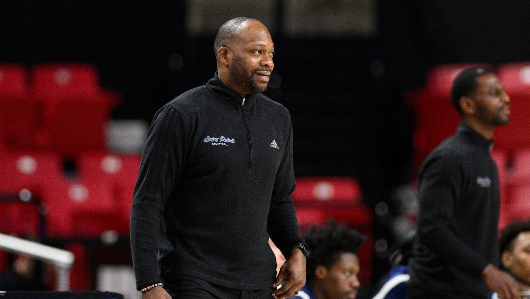 Saint Peter's head coach Bashir Mason during the first half of an NCAA college basketball game against Maryland, Thursday, Dec. 22, 2022, in College Park, Md.