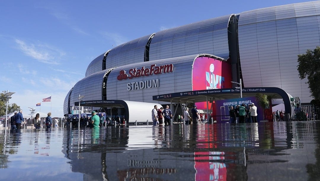 Fans arrives for the NFL Super Bowl 57 football game between the Kansas City Chiefs and the Philadelphia Eagles, Sunday, Feb. 12, 2023, in Glendale, Ariz.