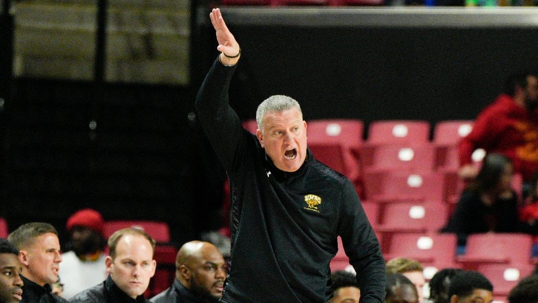 UMBC head coach Jim Ferry calls out to players during the first half of the team's NCAA college basketball game against Maryland Thursday, Dec. 29, 2022, in College Park, Md. Maryland won 80-64. (AP Photo/Jess Rapfogel)