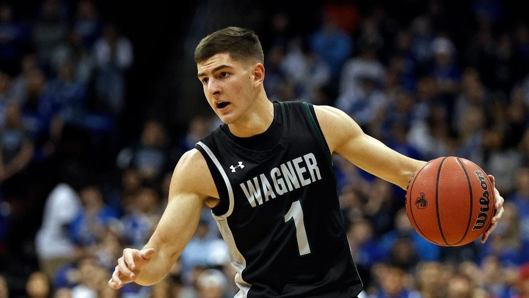 Wagner guard Javier Ezquerra (1) dribbles against Seton Hall during the first half of an NCAA college basketball game Wednesday, Dec. 1, 2021, in Newark, N.J.