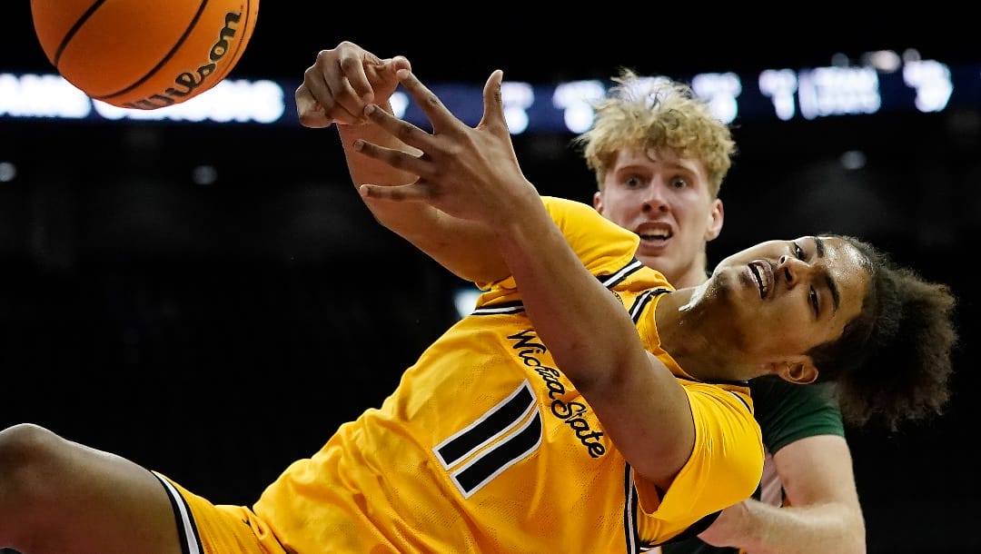 Wichita State forward Kenny Pohto (11) can't hold onto a rebound during the second half of an NCAA college basketball game against San Francisco in the Hall of Fame Classic, Tuesday, Nov. 22, 2022, in Kansas City, Mo. San Francisco won 67-63. (AP Photo/Charlie Riedel)