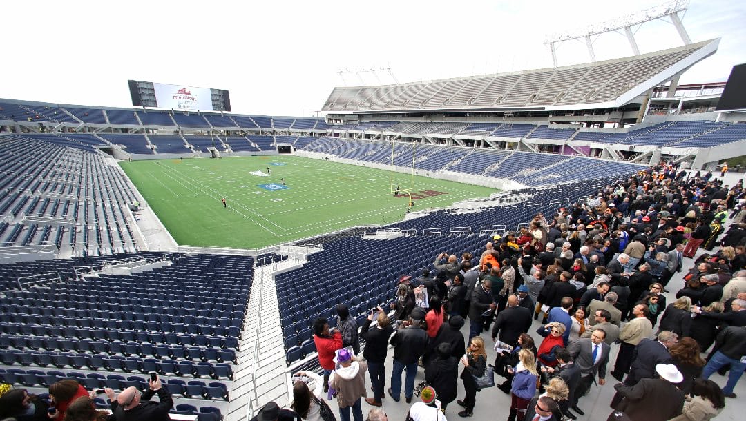 In this Nov. 19, 2014, file photo, city officials and guests get a preview of the new Citrus Bowl stadium, also known as Camping World Stadium, in Orlando, Fla. There are 23 venues bidding to host soccer matches at the 2026 World Cup in the United States, Mexico and Canada.