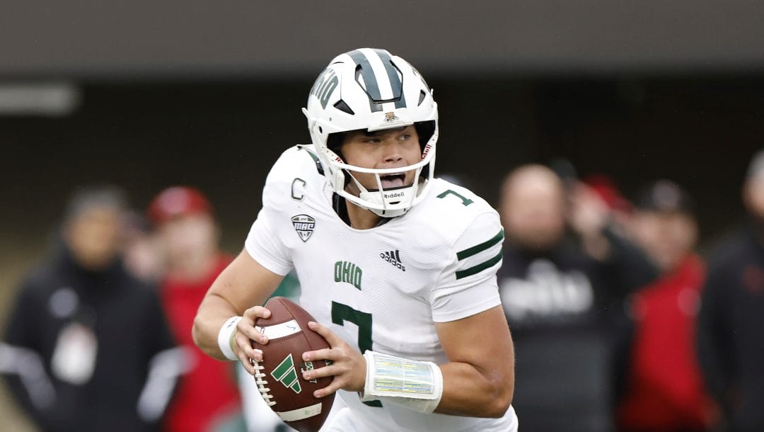 Ohio Bobcats quarterback Kurtis Rourke (7) looks to pass the ball against Northern Illinois Huskies during the second half of an NCAA football game on Saturday, Oct. 14, 2023, in Dekalb, Ill.