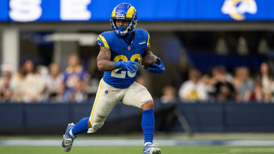 Los Angeles Rams running back Kyren Williams (23) runs with the ball during an NFL football game against the Washington Commanders, Sunday, Dec. 17, 2023, in Inglewood, Calif.