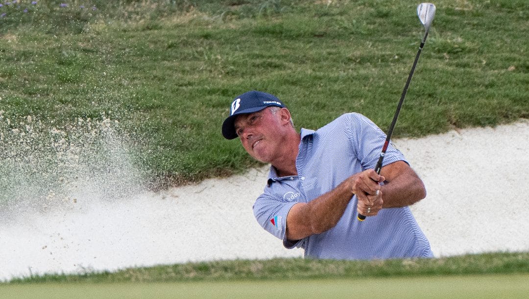 Matt Kuchar hits out of a bunker during the final round of the Valero Texas Open golf tournament in San Antonio, Sunday, April 2, 2023.