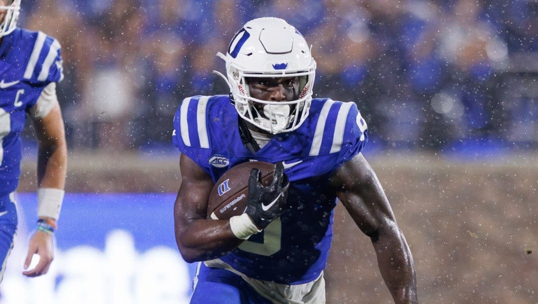 Duke's Jaquez Moore (9) carries the ball during the second half of an NCAA college football game in Durham, N.C., Saturday, Sept. 9, 2023. (AP Photo/Ben McKeown)