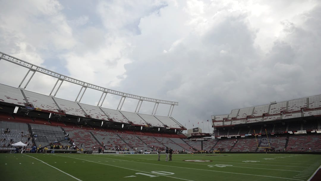 Inclement weather moves over Williams-Brice Stadium before an NCAA college football game between Georgia and South Carolina on Saturday, Sept. 13, 2014, in Columbia, S.C.