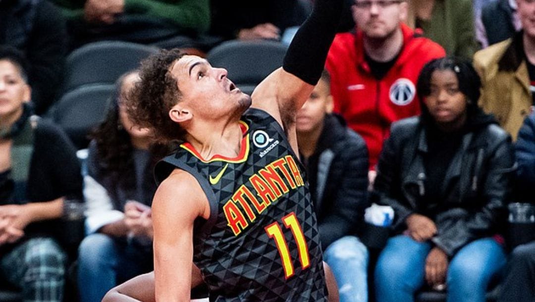 Trae Young of the Atlanta Hawks attempting a layup during an NBA game in January 2020.