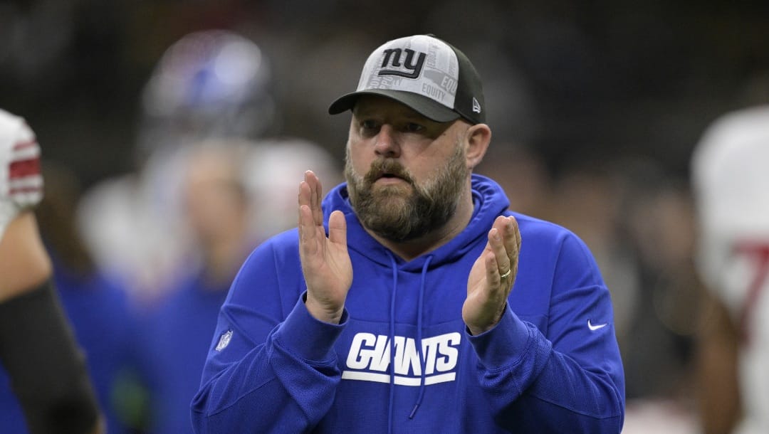 New York Giants head coach Brian Daboll claps for his players during an NFL football game against the New Orleans Saints in New Orleans, Sunday, Dec. 17, 2023. (AP Photo/Matthew Hinton)