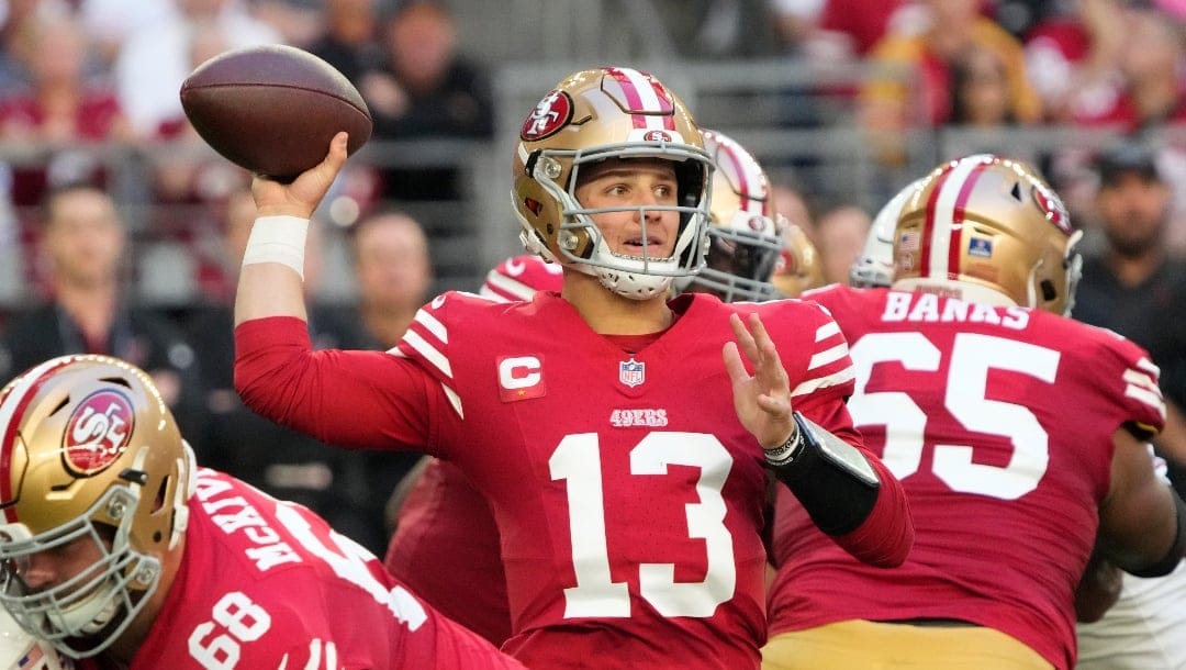 San Francisco 49ers quarterback Brock Purdy (13) throws the ball against the Arizona Cardinals during the first half of an NFL football game, Sunday, Dec. 17, 2023, in Glendale, Ariz.