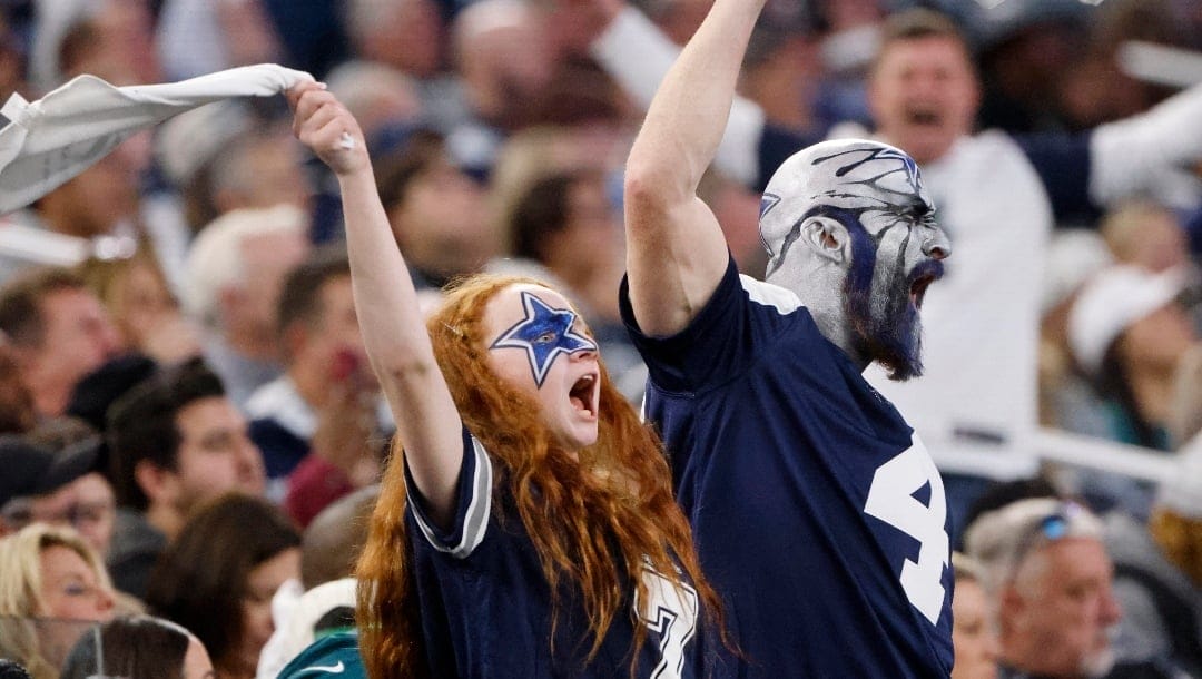 Dallas Cowboys fans cheer during an NFL Football game in Arlington, Texas, Sunday, Dec. 10, 2023. (AP Photo/Michael Ainsworth)