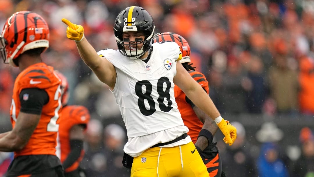 Pittsburgh Steelers tight end Pat Freiermuth (88) celebrates a first down during the first half of an NFL football game against the Cincinnati Bengals in Cincinnati, Sunday, Nov. 26, 2023. (AP Photo/Carolyn Kaster)