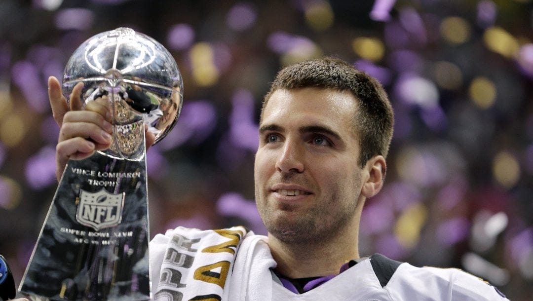 In this Feb. 13, 2013 file photo, Baltimore Ravens quarterback Joe Flacco (5) holds the Vince Lombardi Trophy after defeating the San Francisco 49ers 34-31 in the NFL Super Bowl XLVII football game in New Orleans.