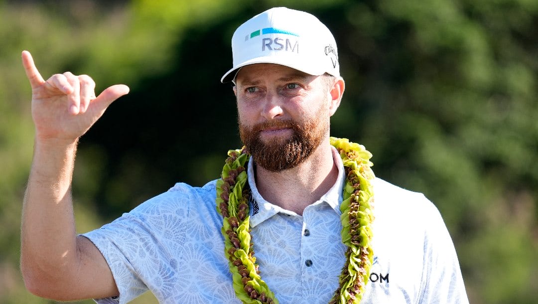 Chris Kirk motions on the 18th green after the final round of The Sentry golf event, Sunday, Jan. 7, 2024, at Kapalua Plantation Course in Kapalua, Hawaii.