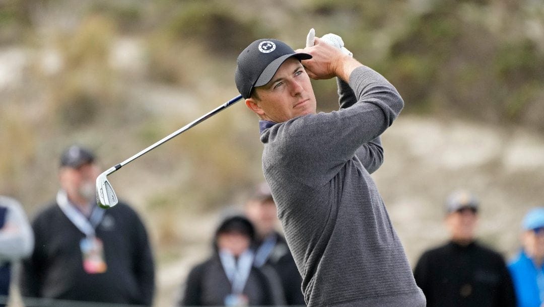 Jordan Spieth follows his approach shot to the fourth green of the Spyglass Hill Golf Course during the first round of the AT&T Pebble Beach Pro-Am golf tournament in Pebble Beach, Calif., Thursday, Feb. 2, 2023.