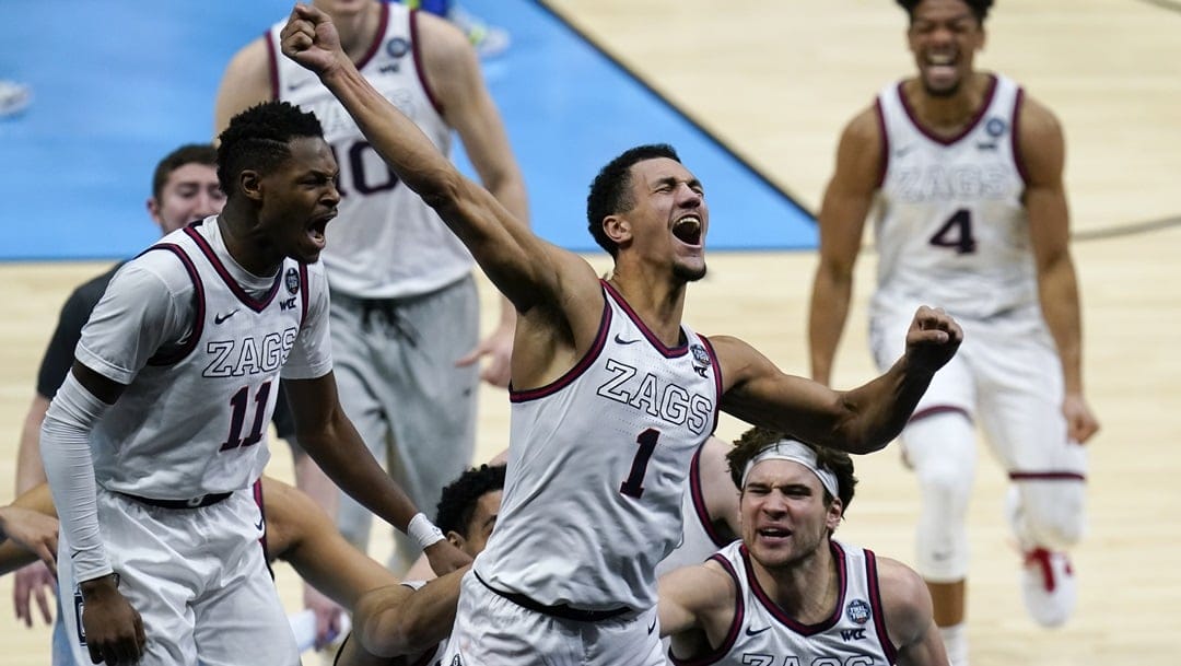 Gonzaga guard Jalen Suggs (1) celebrates making the game-winning basket against UCLA during overtime in a men's Final Four NCAA college basketball tournament semifinal game, Saturday, April 3, 2021, at Lucas Oil Stadium in Indianapolis. Gonzaga won 93-90.