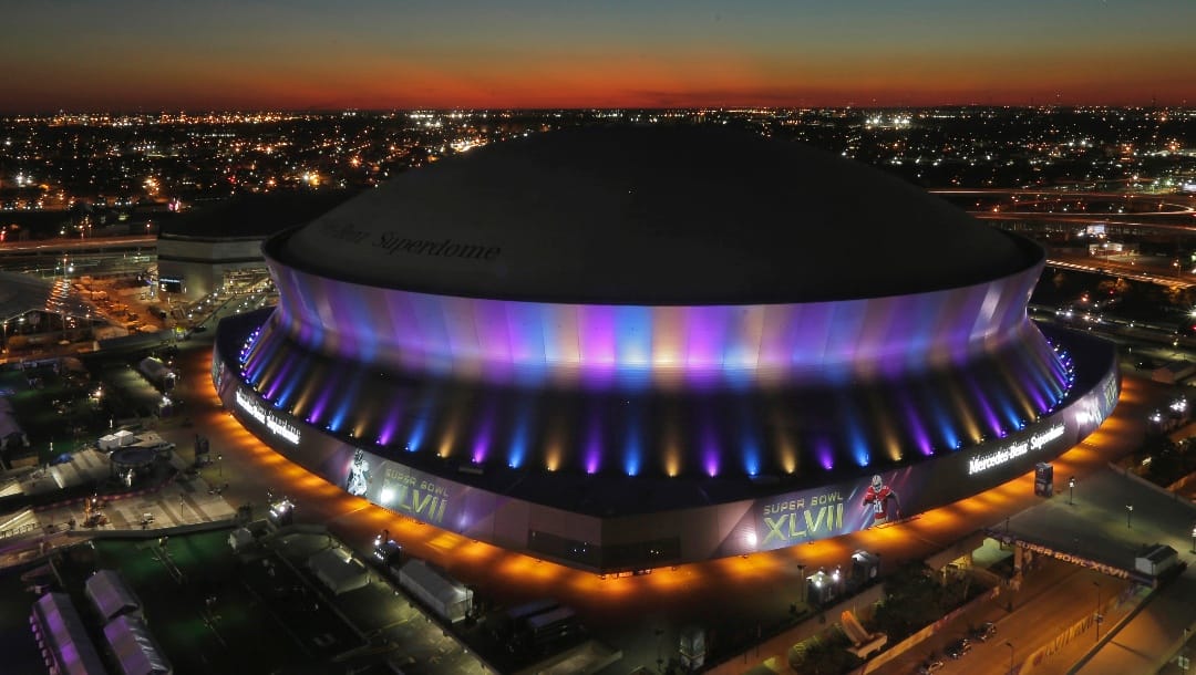 The Superdome, where the NFL Super Bowl XLVII football game between the San Francisco 49ers and Baltimore Ravens will be played, is seen at sunset Friday, Feb. 1, 2013, in New Orleans. (AP Photo/Charlie Riedel)