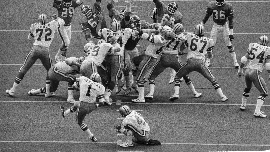 Dallas kicker Efren Herrera (1) kicks a field goal over the outstretched arms of the Denver defenders in first quarter action in Super Bowl XII in New Orleans, La., Jan. 15, 1978. (AP Photo)
