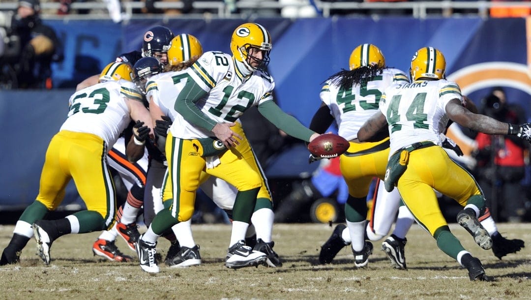 Green Bay Packers' Aaron Rodgers (12)m during the first half of the NFC Championship NFL football game Sunday, Jan. 23, 2011, in Chicago.