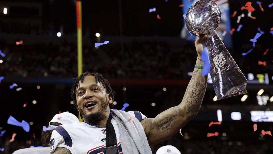 New England Patriots' Patrick Chung lifts the trophy after the NFL Super Bowl 53 football game against the Los Angeles Rams in Atlanta, in this Sunday, Feb. 3, 2019, file photo. Patrick Chung says he is retiring from the NFL after 11 seasons and three Super Bowl rings with the Patriots. Chung announced his decision in an Instagram post, Thursday, March 18, 2021, thanking coach Bill Belichick and team owner Robert Kraft for drafting him in 2009.
