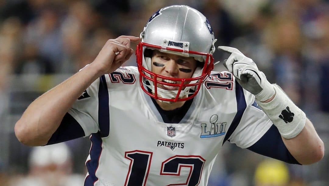 In this Feb. 4, 2018, file photo, New England Patriots quarterback Tom Brady (12), calls a play during the first half of the NFL Super Bowl 52 football game against the Philadelphia Eagles in Minneapolis. The wide-eyed, talented Jared Goff will try to lead his Los Angeles Rams past the grizzled, 41-year-old Brady, who is looking to guide the Patriots to their sixth Super Bowl victory.