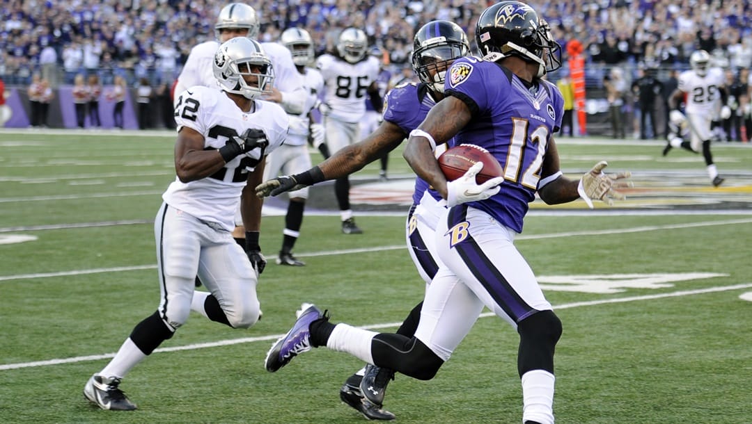 In this Nov. 11, 2012, file photo, Baltimore Ravens wide receiver Jacoby Jones (12) looks back as he returns a kickoff 105 yards for touchdown during the second half of an NFL football game against the Oakland Raiders in Baltimore. Each of the eight teams still standing in the playoffs can thank their special teams for helping to get them there. That's just one reason players remain upset that Commissioner Roger Goodell has floated the idea of abolishing kickoffs altogether. Jones returned two kickoffs for touchdowns this season.