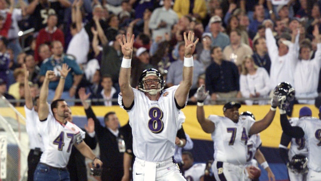 FILE - In this Jan. 28, 2001, file photo, Baltimore Ravens quarterback Trent Dilfer (8) celebrates with teammates after throwing a 38-yard touchdown pass to wide receiver Brandon Stokley during the first quarter of Super Bowl XXXV against the New York Giants in Tampa, Fla. (AP Photo/Rick Bowmer, File)