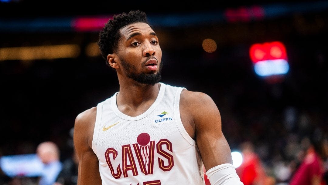 Donovan Mitchell #45 of the Cleveland Cavaliers takes part in warm ups before playing the Toronto Raptors in their basketball game at the Scotiabank Arena on February 10, 2024 in Toronto, Ontario, Canada.