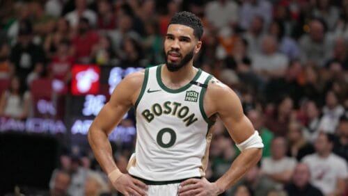 Jayson Tatum #0 of the Boston Celtics looks on during the game against the Miami Heat on February 11, 2024 at Kaseya Center in Miami, Florida.