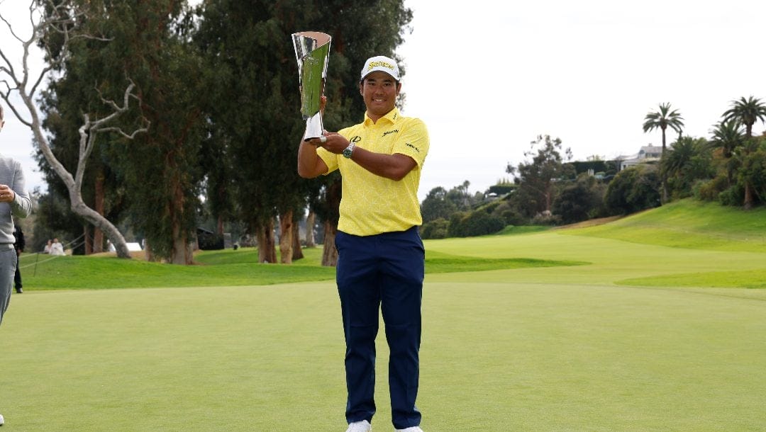 Hideki Matsuyama, of Japan, holds the the Genesis Invitational trophy after he won the final round of the Genesis Invitational golf tournament at Riviera Country Club, Sunday, Feb. 18, 2024, in the Pacific Palisades area of, Los Angeles.