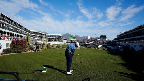 Scottie Scheffler tees off on the 16th hole during the final round of the Phoenix Open golf tournament, Sunday, Feb. 12, 2023, in Scottsdale, Ariz.