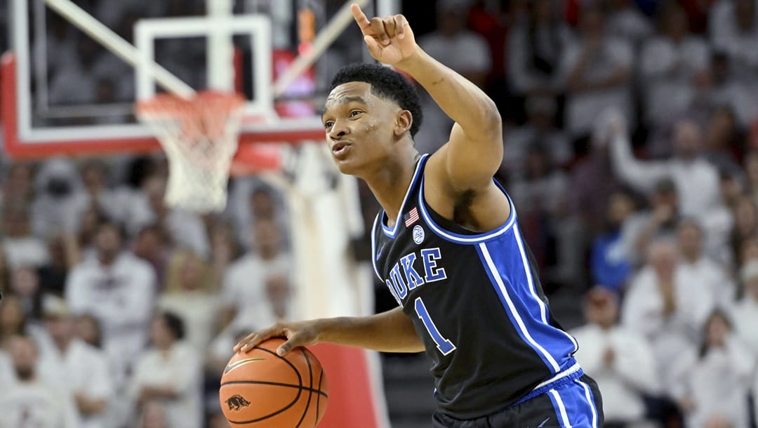 Duke guard Caleb Foster (1) runs a play against Arkansas during an NCAA college basketball game Wednesday, Nov. 29, 2023, in Fayetteville, Ark.