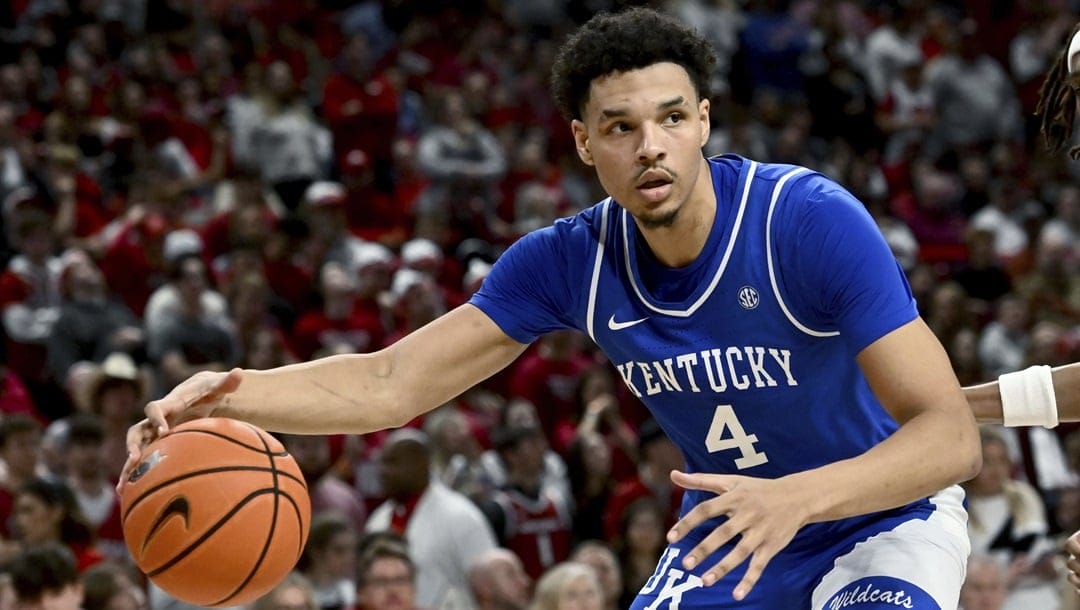 Kentucky forward Tre Mitchell (4) runs a play against Arkansas during an NCAA college basketball game Saturday, Jan. 27, 2024, in Fayetteville, Ark.