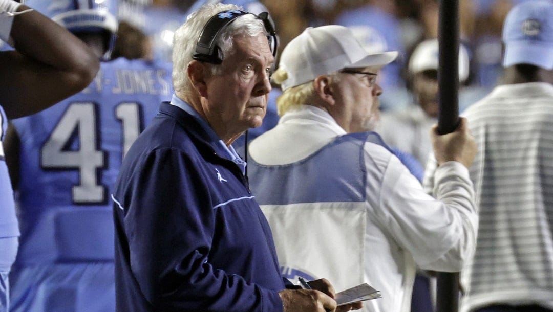 North Carolina head coach Mack Brown watches from the sidelines during the first half of an NCAA college football game against Miami, Saturday, Oct. 14, 2023, in Chapel Hill, N.C.