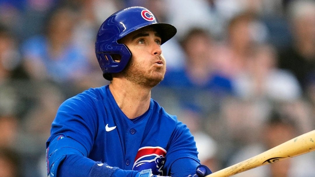 FILE - Chicago Cubs' Cody Bellinger watches his home run during the third inning of a baseball game against the New York Yankees, July 7, 2023, in New York. There are still some premium free agents available for Major League Baseball teams as the calendar nears March. Two-time Cy Young Winner Blake Snell, six-time All-Star J.D. Martinez and former MVP Cody Bellinger are among the players who haven't found a home. (AP Photo/Frank Franklin II, File)