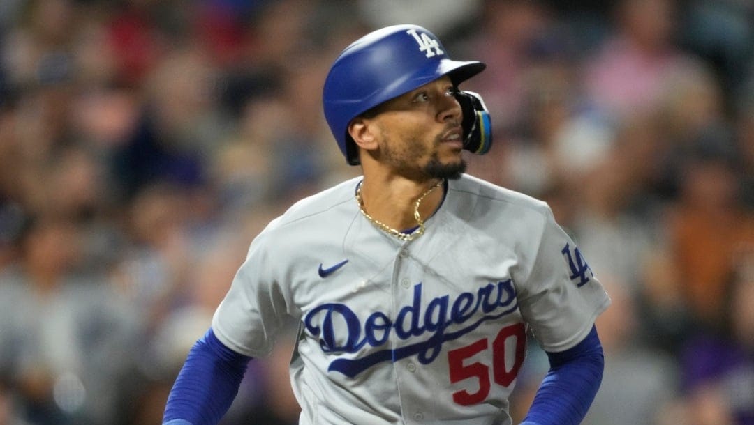 Los Angeles Dodgers right fielder Mookie Betts (50) in the sixth inning of a baseball game Wednesday, Sept. 27, 2023, in Denver. (AP Photo/David Zalubowski)