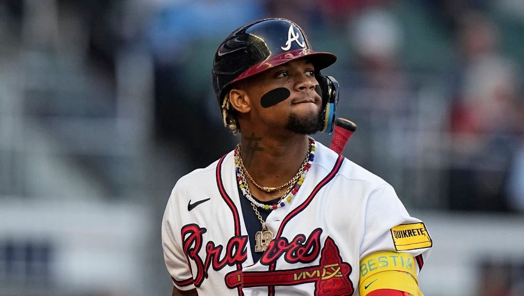 Atlanta Braves right fielder Ronald Acuna Jr. (13) reacts after strinking out in the first inning of Game 2 of a baseball NL Division Series against the Philadelphia Phillies, Monday, Oct. 9, 2023, in Atlanta. (AP Photo/Brynn Anderson)