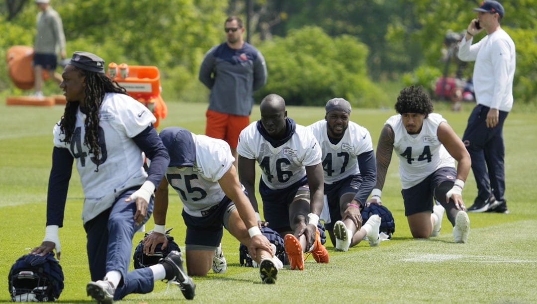 Chicago Bears players work on the field during NFL football OTA practice in Lake Forest, Ill., Wednesday, June 7, 2023.