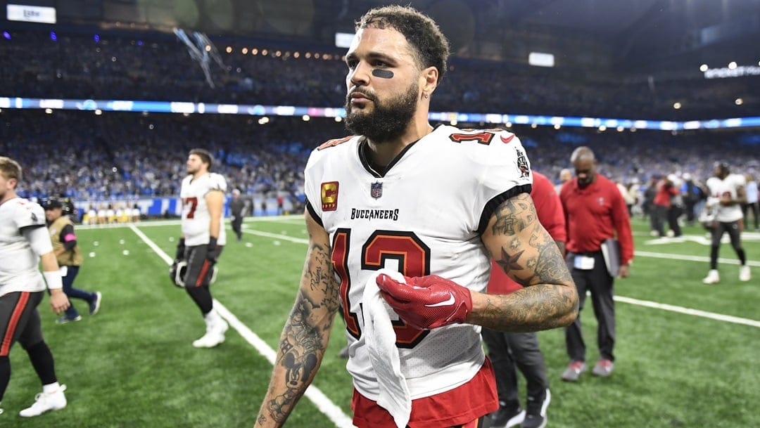 Tampa Bay Buccaneers wide receiver Mike Evans walks off the field following an NFL football NFC divisional playoff game against the Detroit Lions, Sunday, Jan. 21, 2024, in Detroit. The Lions won 31-23.