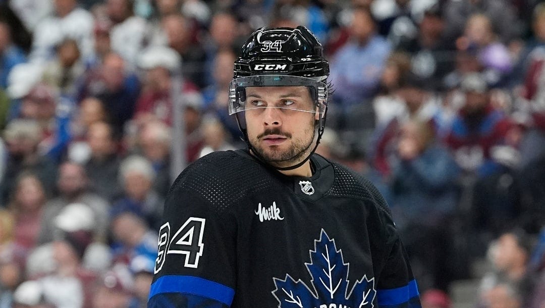 Toronto Maple Leafs center Auston Matthews (34) in the third period of an NHL hockey game Saturday, Feb. 24, 2024, in Denver. (AP Photo/David Zalubowski)