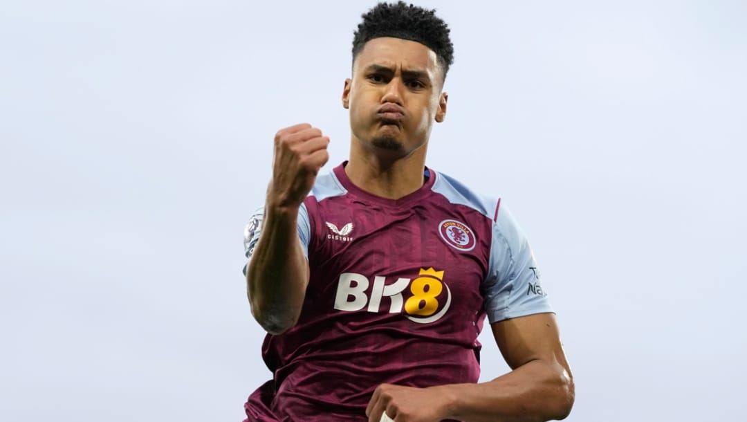 Aston Villa's Ollie Watkins celebrates after scoring his second goal during the English Premier League soccer match between Fulham and Aston Villa at Craven cottage stadium in London, Saturday, Feb. 17, 2024.