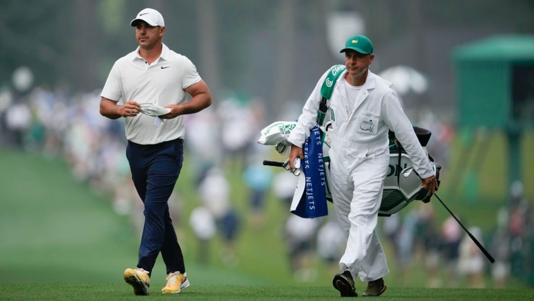 Brooks Koepka walks on the first hole during the second round of the Masters golf tournament at Augusta National Golf Club on Friday, April 7, 2023, in Augusta, Ga.
