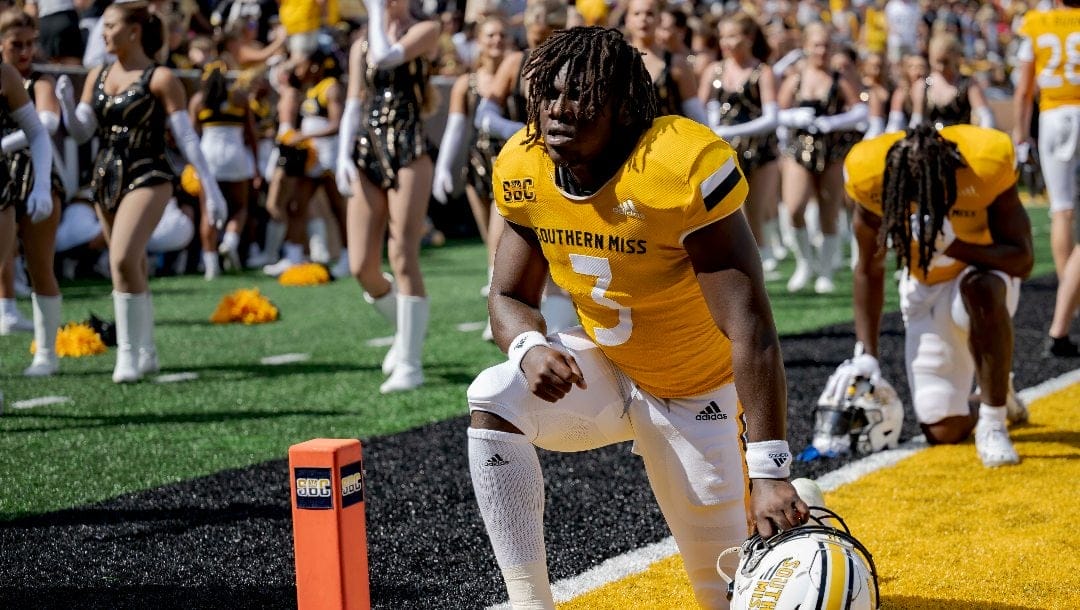 Southern Mississippi running back Frank Gore Jr. (3) kneels in prayer before an NCAA football game against Tulane on Saturday, Sept. 16, 2023, in Hattiesburg, Miss.