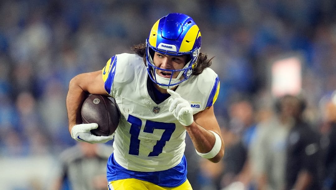 Los Angeles Rams wide receiver Puka Nacua runs towards the endzone for a touchdown during the first half of an NFL wild-card playoff football game against the Detroit Lions, Sunday, Jan. 14, 2024, in Detroit.